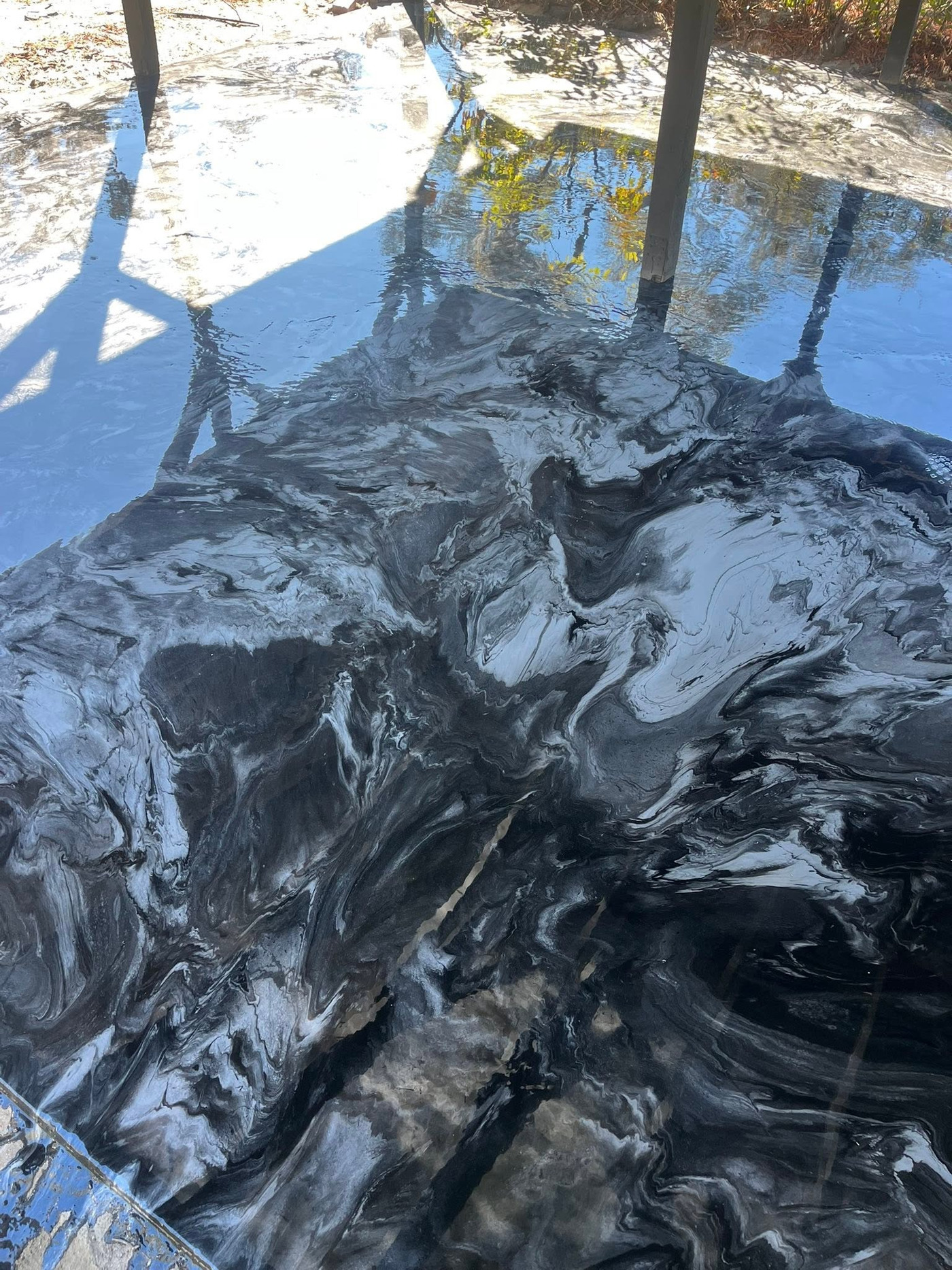Black white and metallic marbled epoxy surface